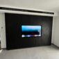 black wood cladding tv wall